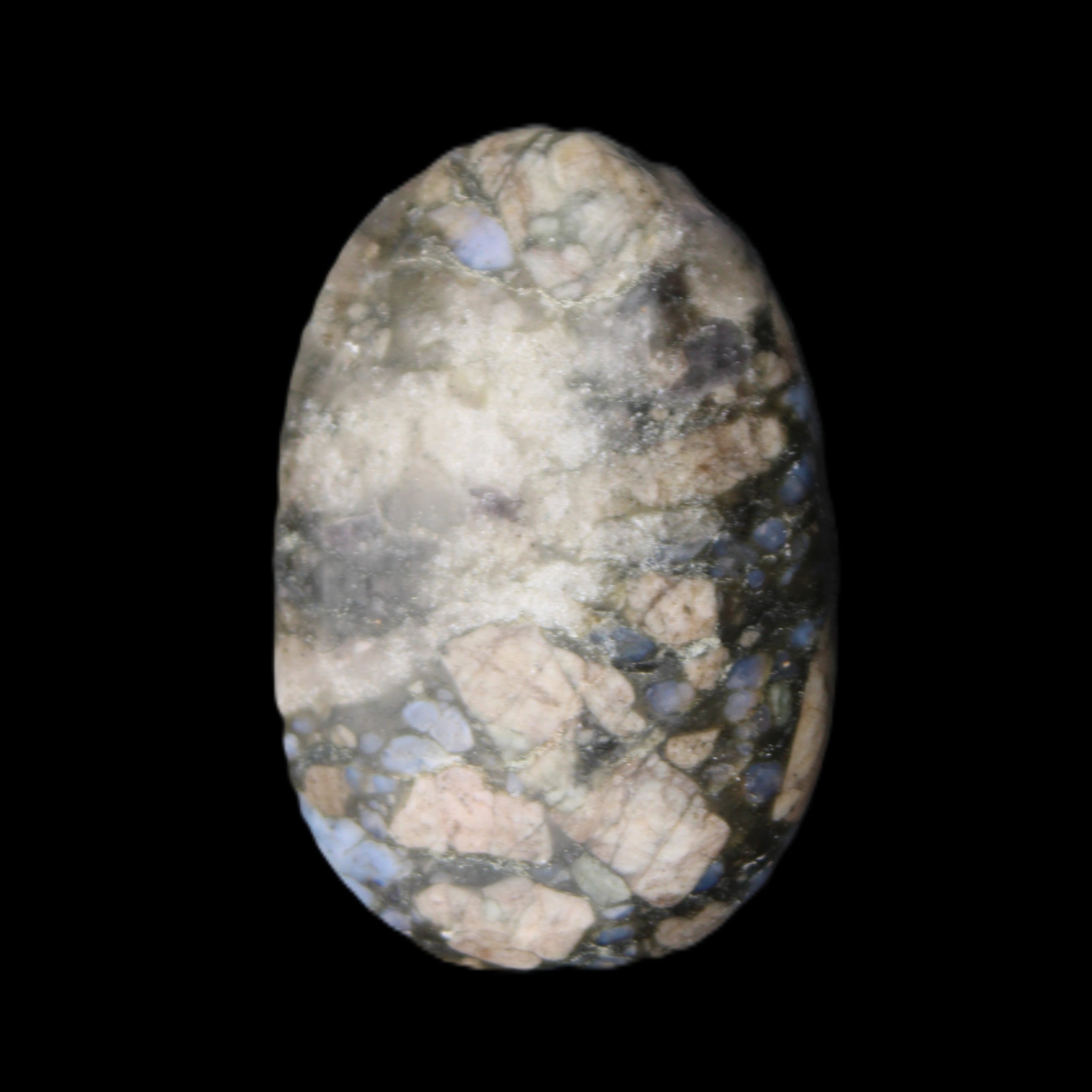 Llanite Que Sera palm stone 52*17*35mm 55g in sunlight - Rocks and Things Store