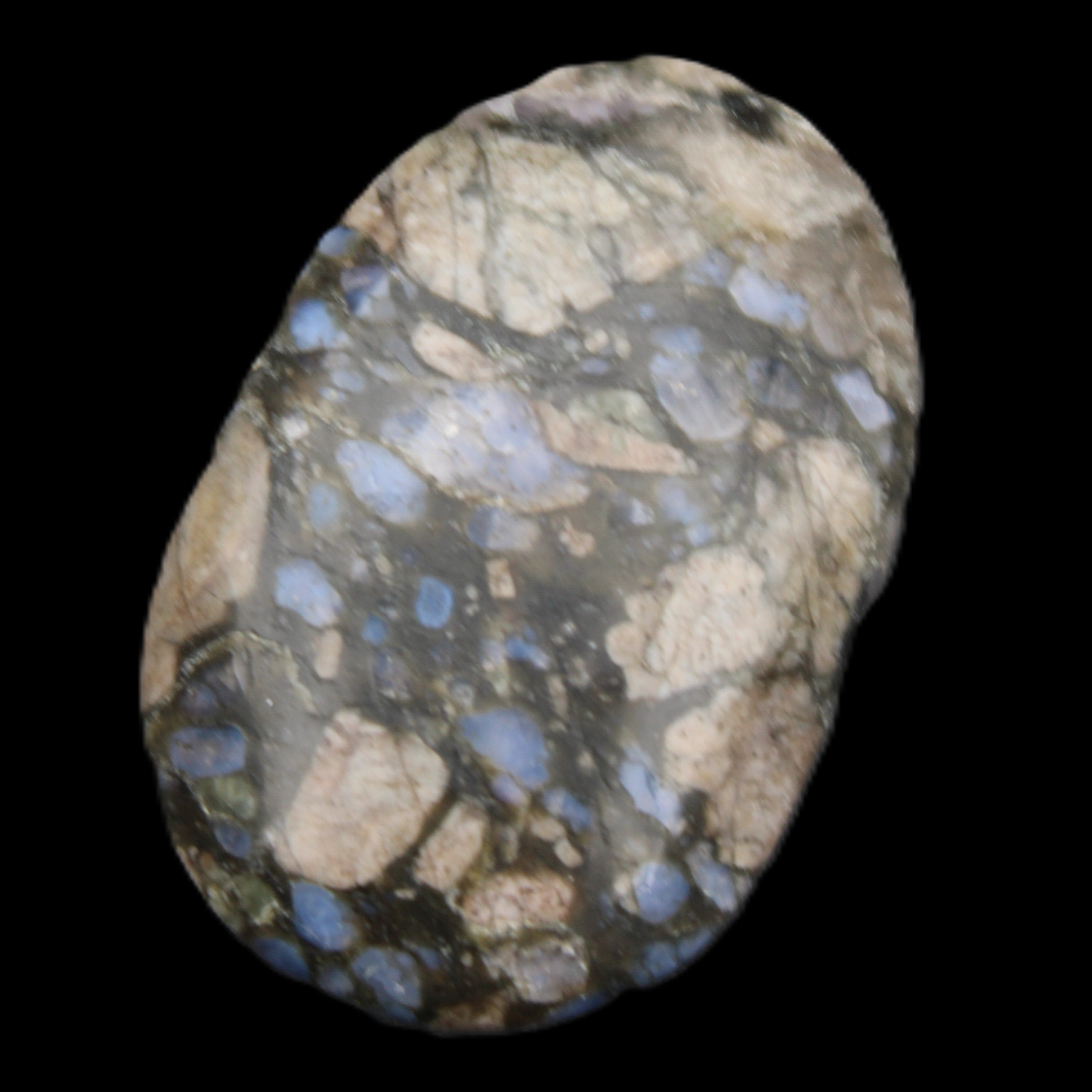 Llanite Que Sera palm stone 52*17*35mm 55g in sunlight - Rocks and Things Store
