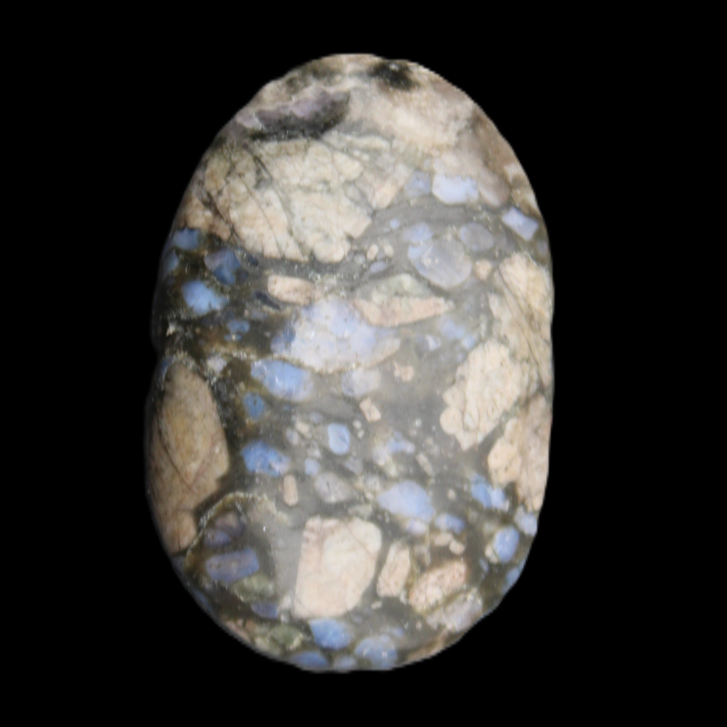 Llanite Que Sera palm stone 52*17*35mm 55g in sunlight - Rocks and Things Store