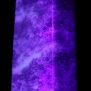 Lepidolite Mica wand 76mm 80g in UV light - Rocks and Things Store