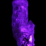 Fenster Golden Diamond Quartz with hydrocarbons & enhydros 33-50mm 10-14.3g in UV light