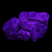 Fenster Golden Diamond Quartz with hydrocarbons & enhydros 33-50mm 10-14.3g in UV light - Rocks and Things Store