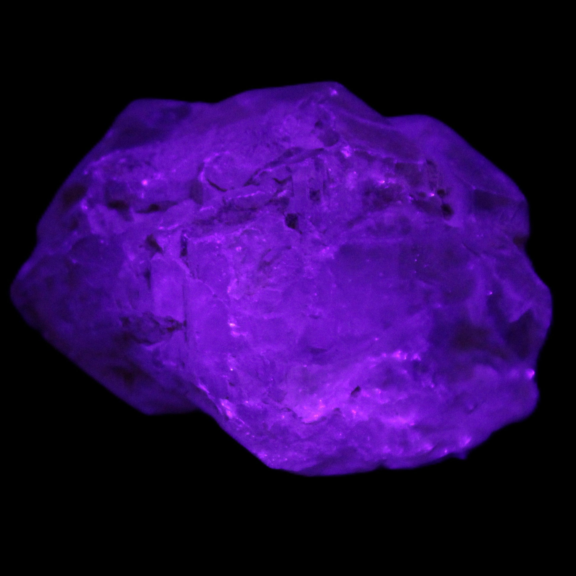 Fenster Golden Diamond Quartz with hydrocarbons & enhydros 33-50mm 10-14.3g in UV light - Rocks and Things Store