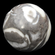 Thousand Eye Stone sphere 66mm 404g in sunlight - Rocks and Things Store