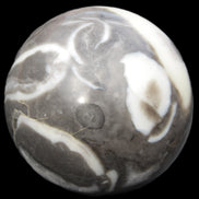 Thousand Eye Stone sphere 66mm 404g in sunlight - Rocks and Things Store