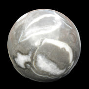 Thousand Eye Stone sphere 66mm 404g in sunlight - Rocks and Things Store