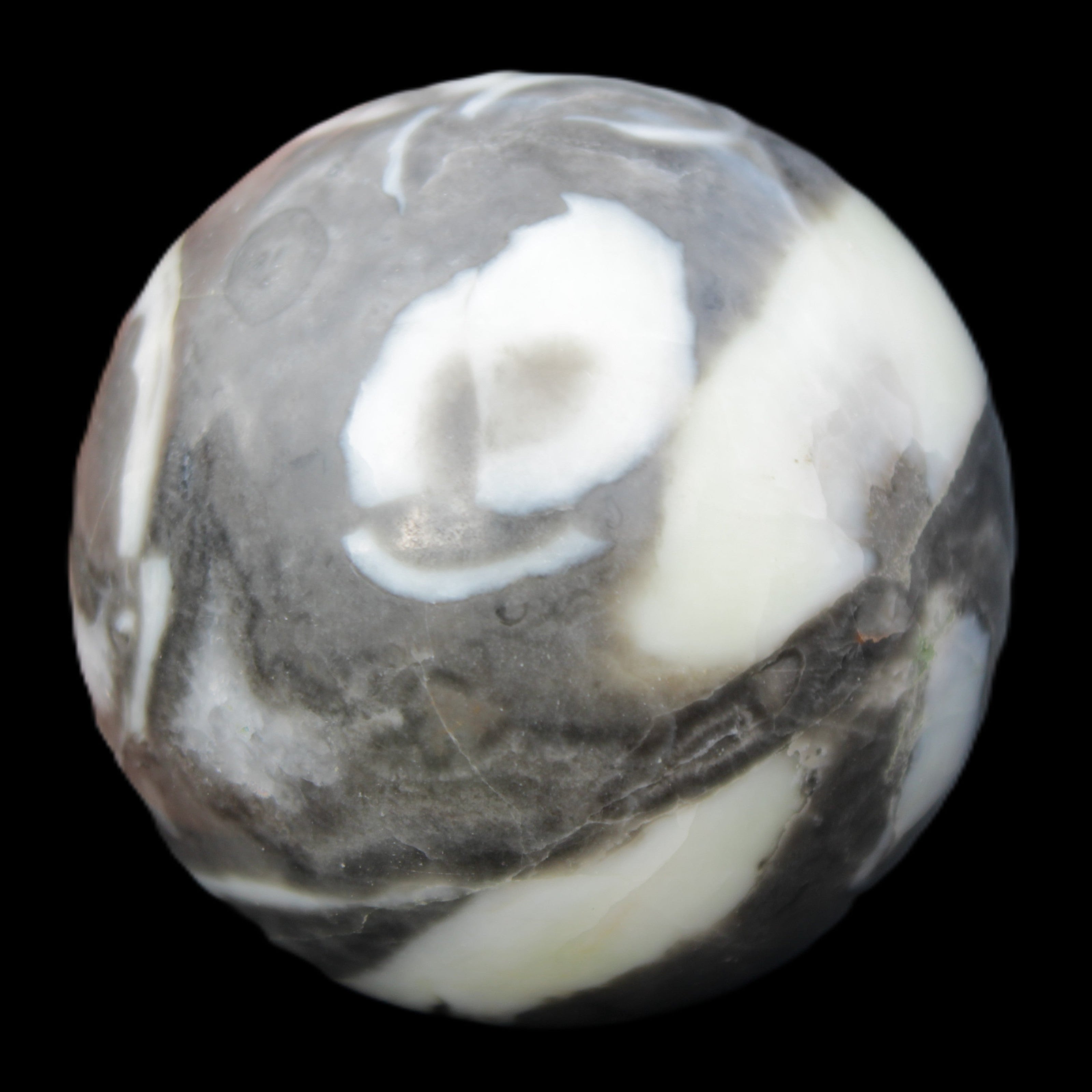 Thousand Eye Stone sphere 66mm 404g in sunlight - Rocks and Things Store