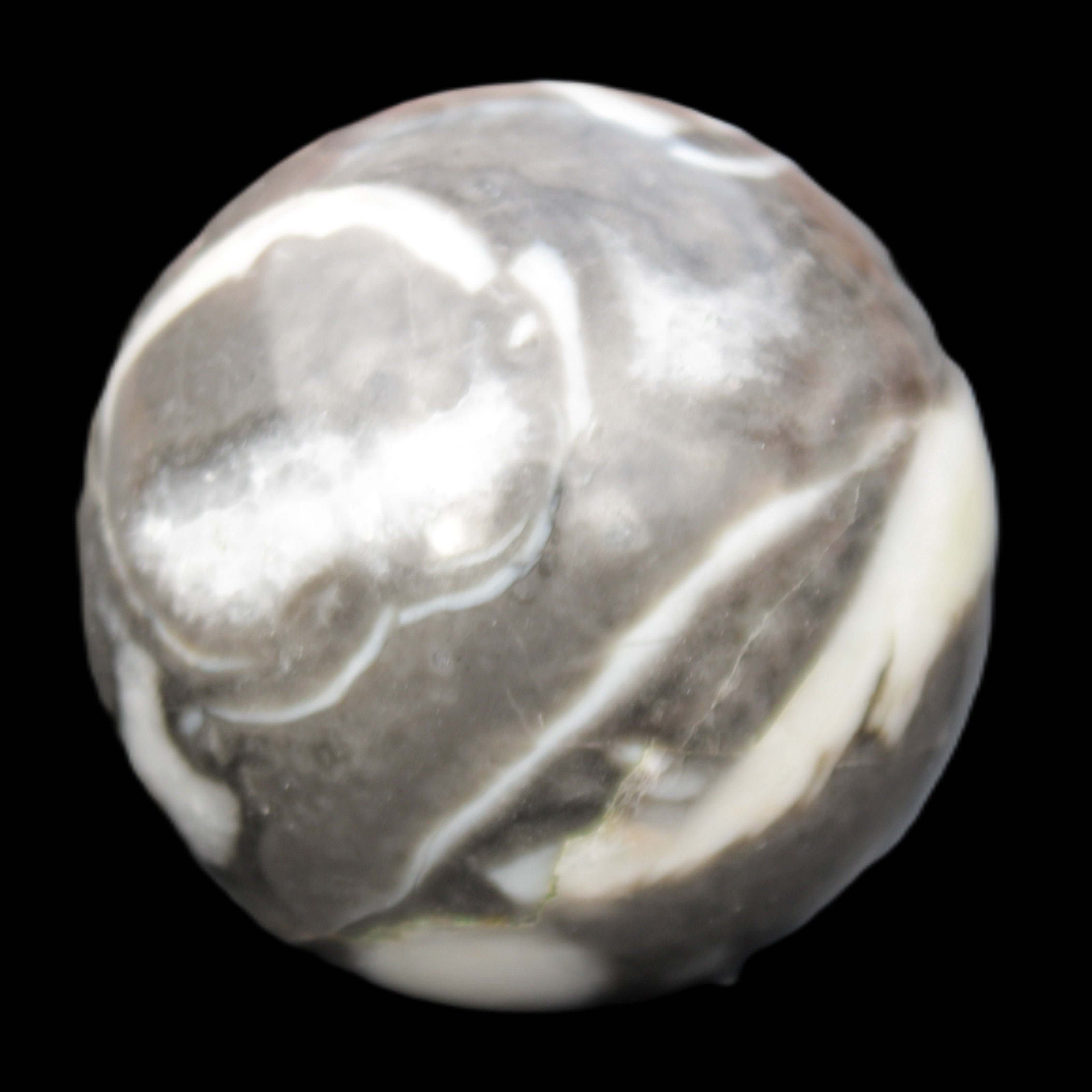 Thousand Eye Stone sphere 66mm 404g in sunlight - Rocks and Things Store