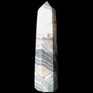 Zebra Calcite wand 79mm 45g in sunlight - Rocks and Things Store