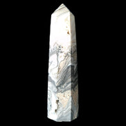 Zebra Calcite wand 79mm 45g in sunlight - Rocks and Things Store