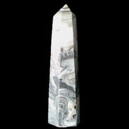 Zebra Calcite wand 79mm 45g in sunlight - Rocks and Things Store