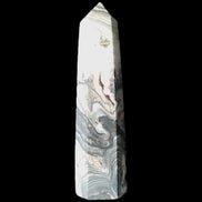 Zebra Calcite wand 79mm 45g in sunlight - Rocks and Things Store