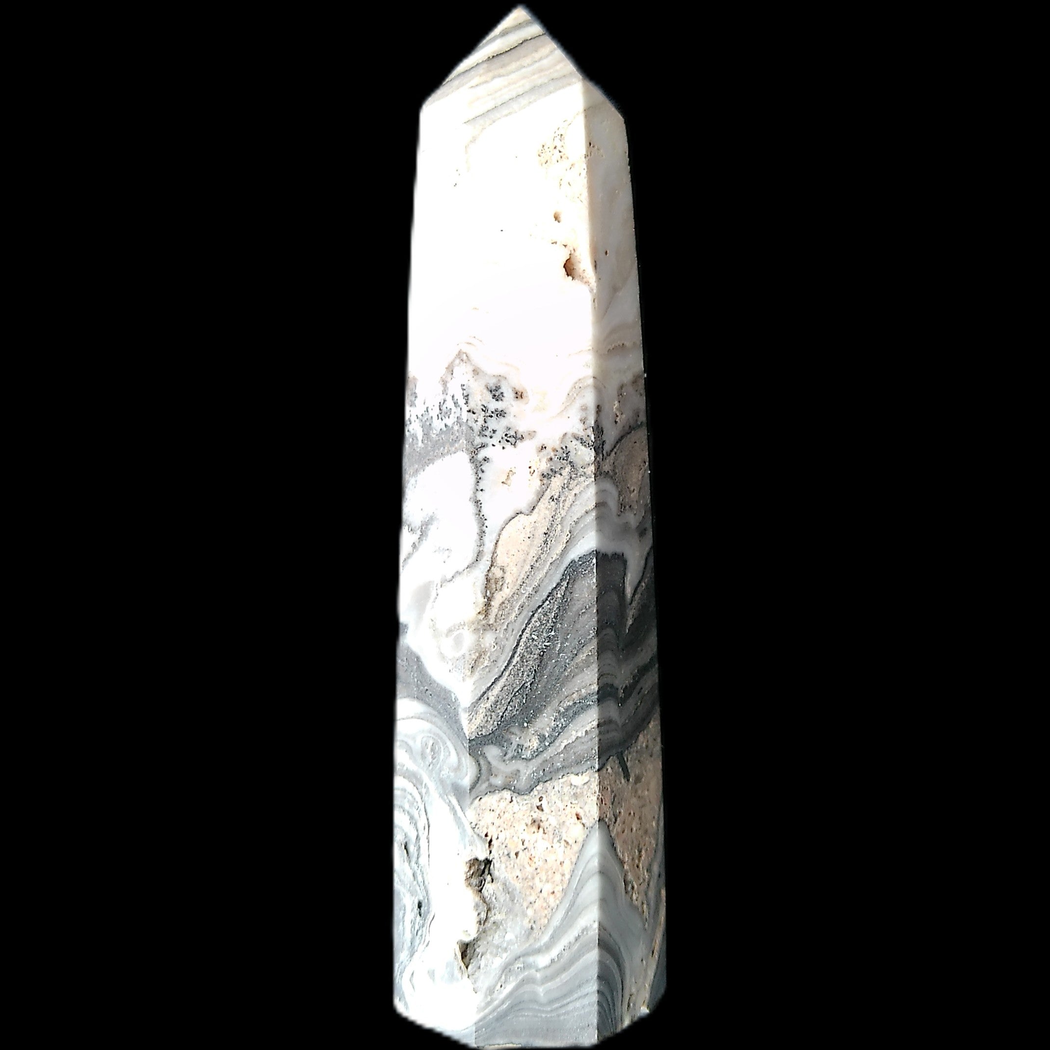 Zebra Calcite wand 79mm 45g in sunlight - Rocks and Things Store