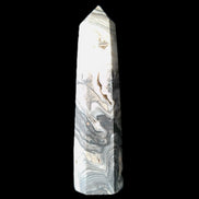 Zebra Calcite wand 79mm 45g in sunlight - Rocks and Things Store