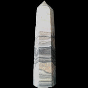 Zebra Calcite wand 79mm 45g in sunlight - Rocks and Things Store