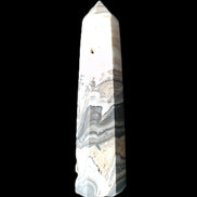Zebra Calcite wand 79mm 45g in sunlight - Rocks and Things Store