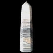 Zebra Calcite wand 79mm 45g in sunlight - Rocks and Things Store