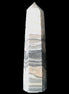 Zebra Calcite wand 79mm 45g in sunlight - Rocks and Things Store