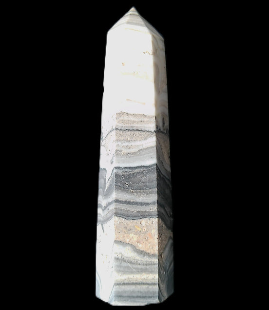 Zebra Calcite wand 79mm 45g in sunlight - Rocks and Things Store