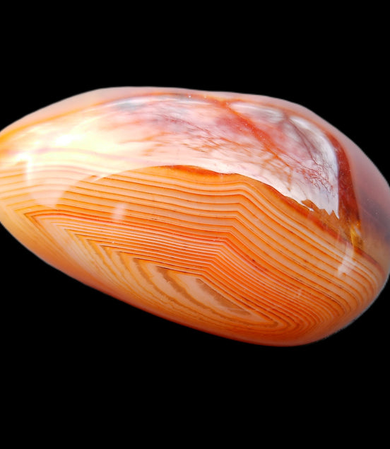 Crazy Lace Agate palmstone 50mm 52g in sunlight - Rocks and Things Store