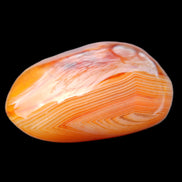 Crazy Lace Agate palmstone 50mm 52g in sunlight - Rocks and Things Store