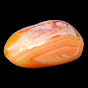 Crazy Lace Agate palmstone 50mm 52g in sunlight - Rocks and Things Store
