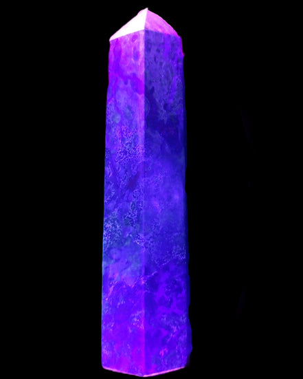 Dragons Blood Stone wand 87*23*19mm 79g in UV light - Rocks and Things Store