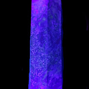 Dragons Blood Stone wand 87*23*19mm 79g in UV light - Rocks and Things Store