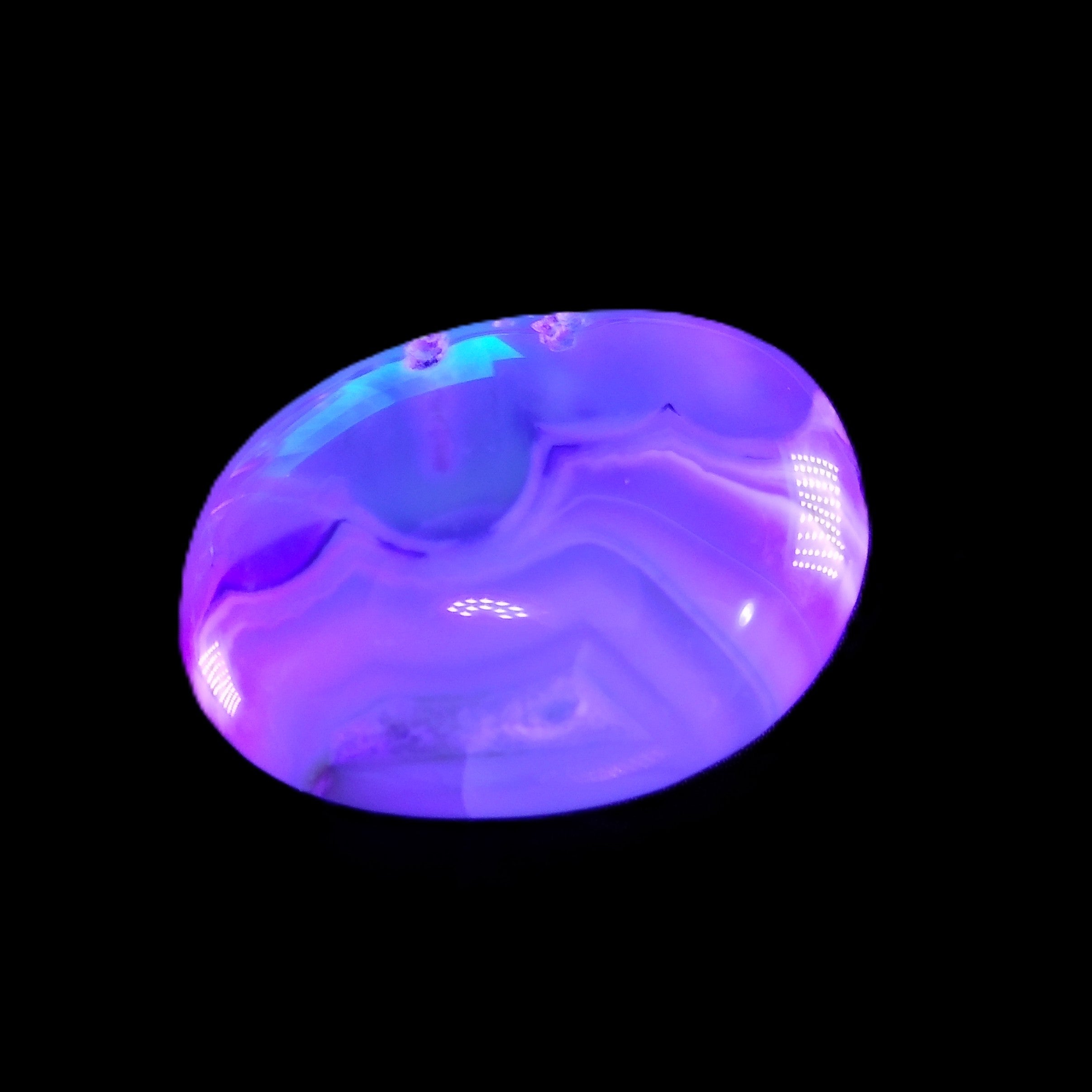 Cherry Blossom Agate palmstone 45*33*16mm 35g in UV light - Rocks and Things Store