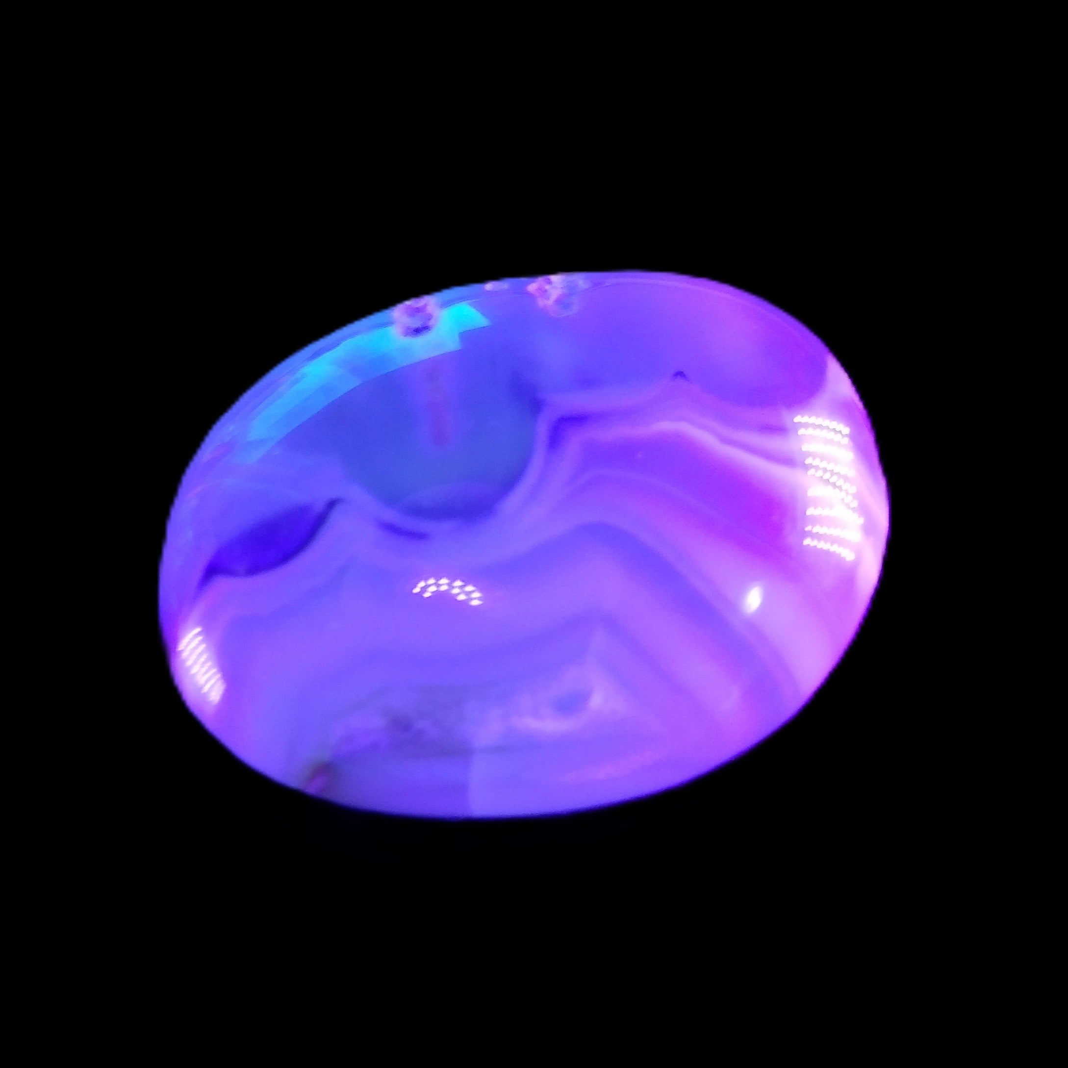Cherry Blossom Agate palmstone 45*33*16mm 35g in UV light - Rocks and Things Store