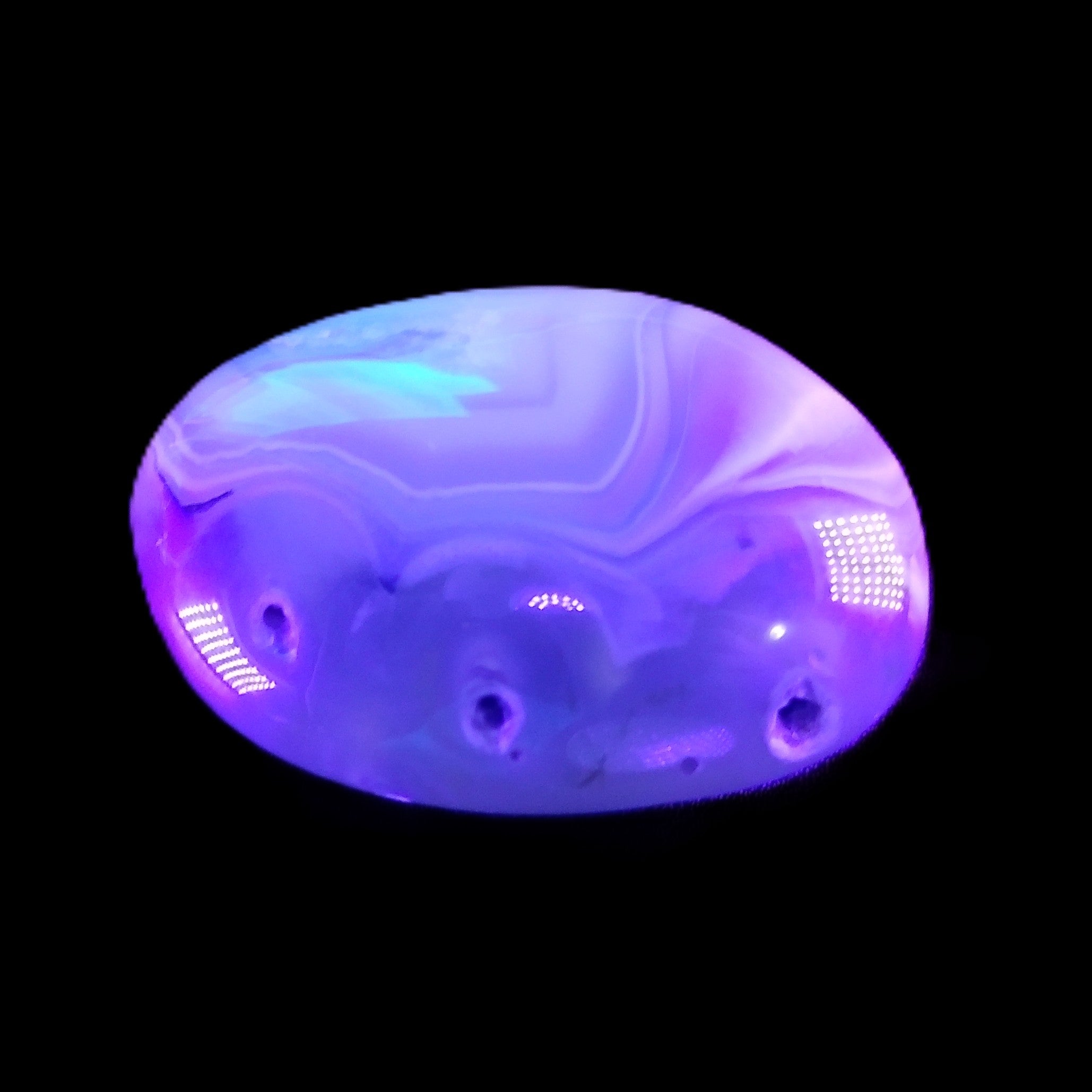 Cherry Blossom Agate palmstone 45*33*16mm 35g in UV light - Rocks and Things Store