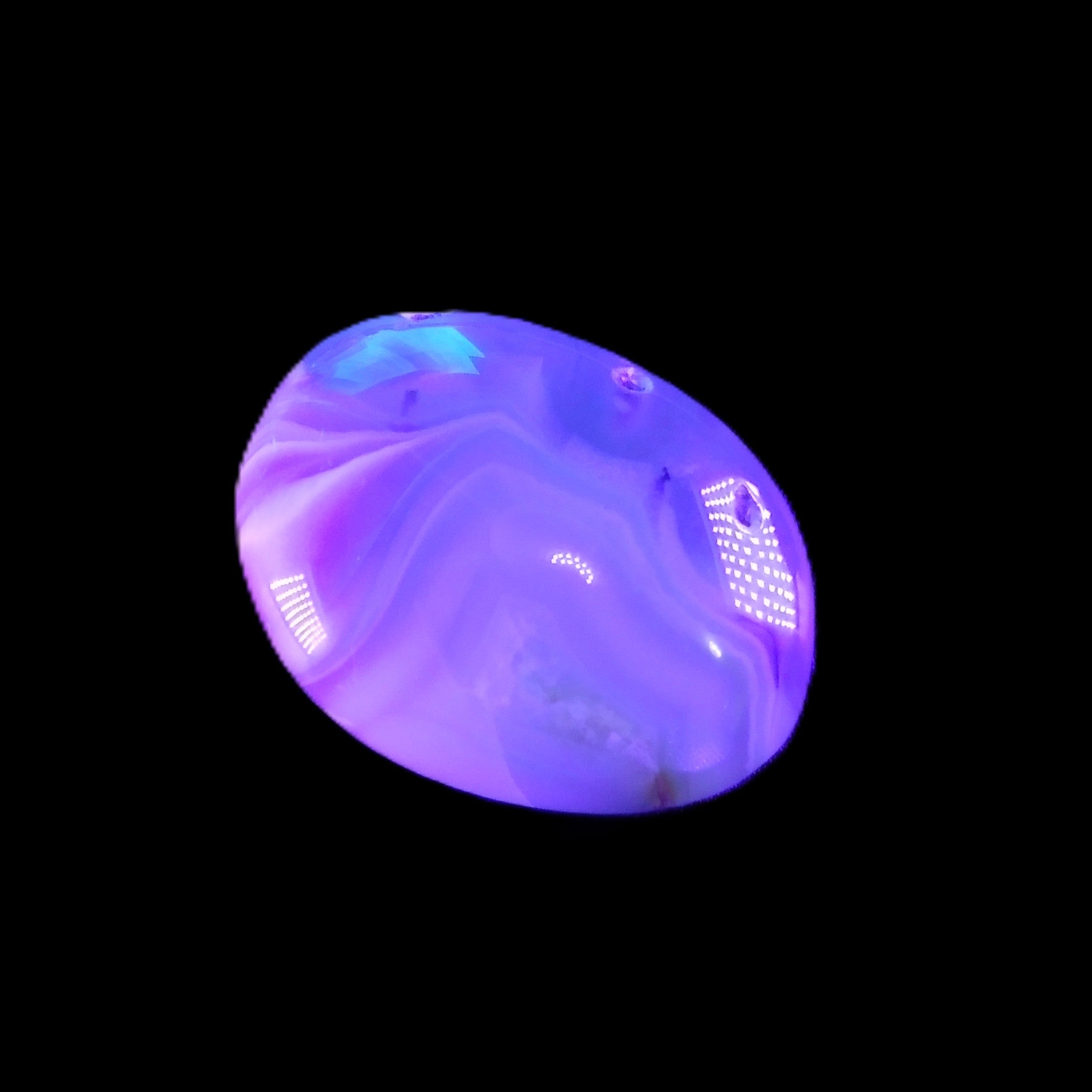 Cherry Blossom Agate palmstone 45*33*16mm 35g in UV light - Rocks and Things Store
