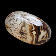 Crazy Lace Sardonyx Agate 36*22*18mm 37g in sunlight - Rocks and Things Store