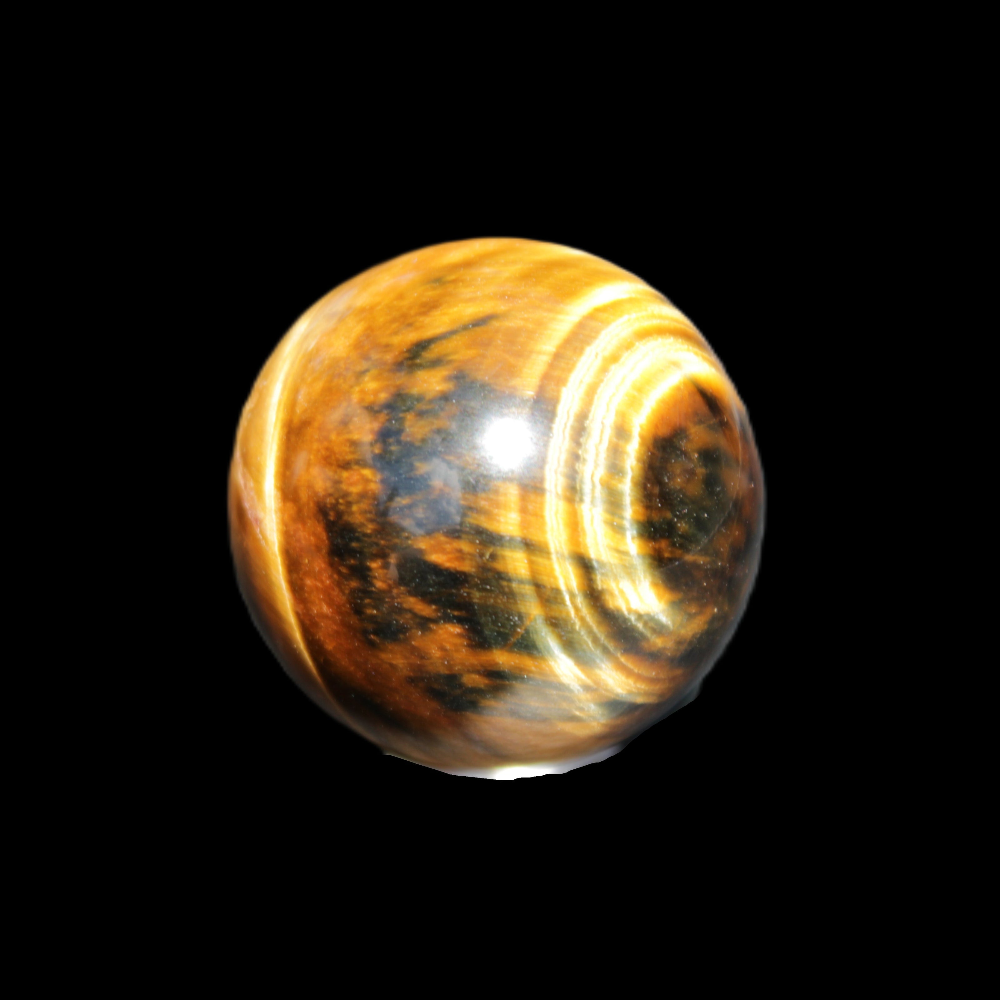 Golden Tigers Eye sphere 35mm 59g in sunlight - Rocks and Things Store