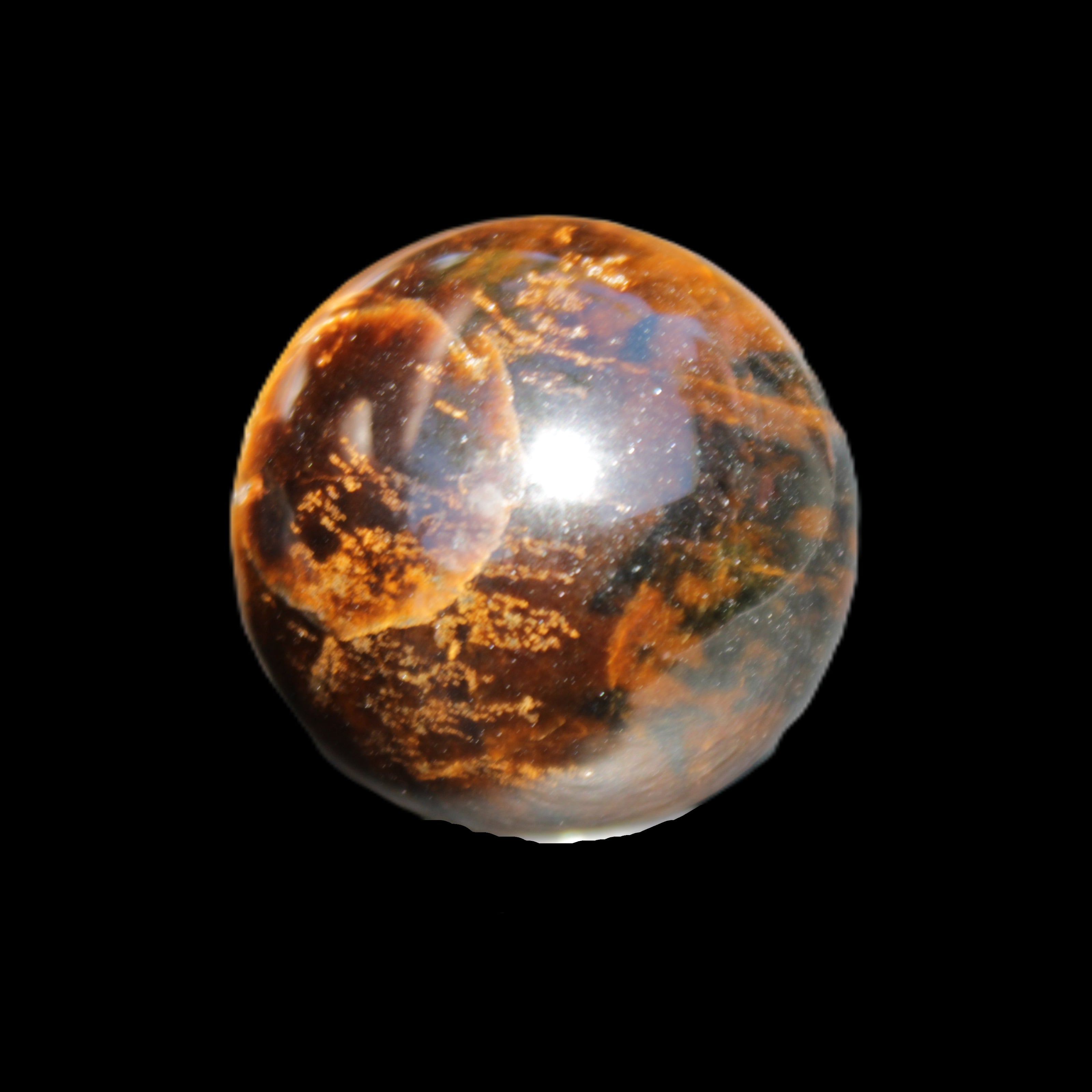 Golden Tigers Eye sphere 35mm 59g in sunlight - Rocks and Things Store