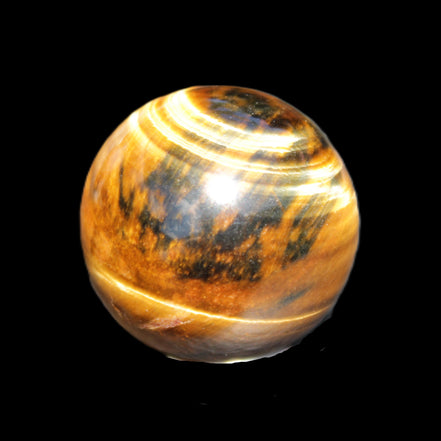 Golden Tigers Eye sphere 35mm 59g in sunlight - Rocks and Things Store