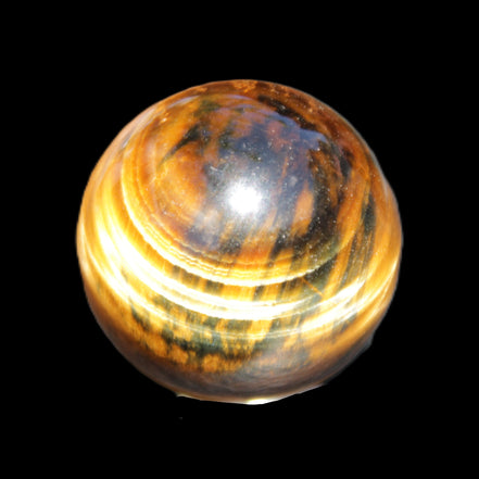 Golden Tigers Eye sphere 35mm 59g in sunlight - Rocks and Things Store