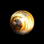 Golden Tigers Eye sphere 35mm 59g in sunlight - Rocks and Things Store