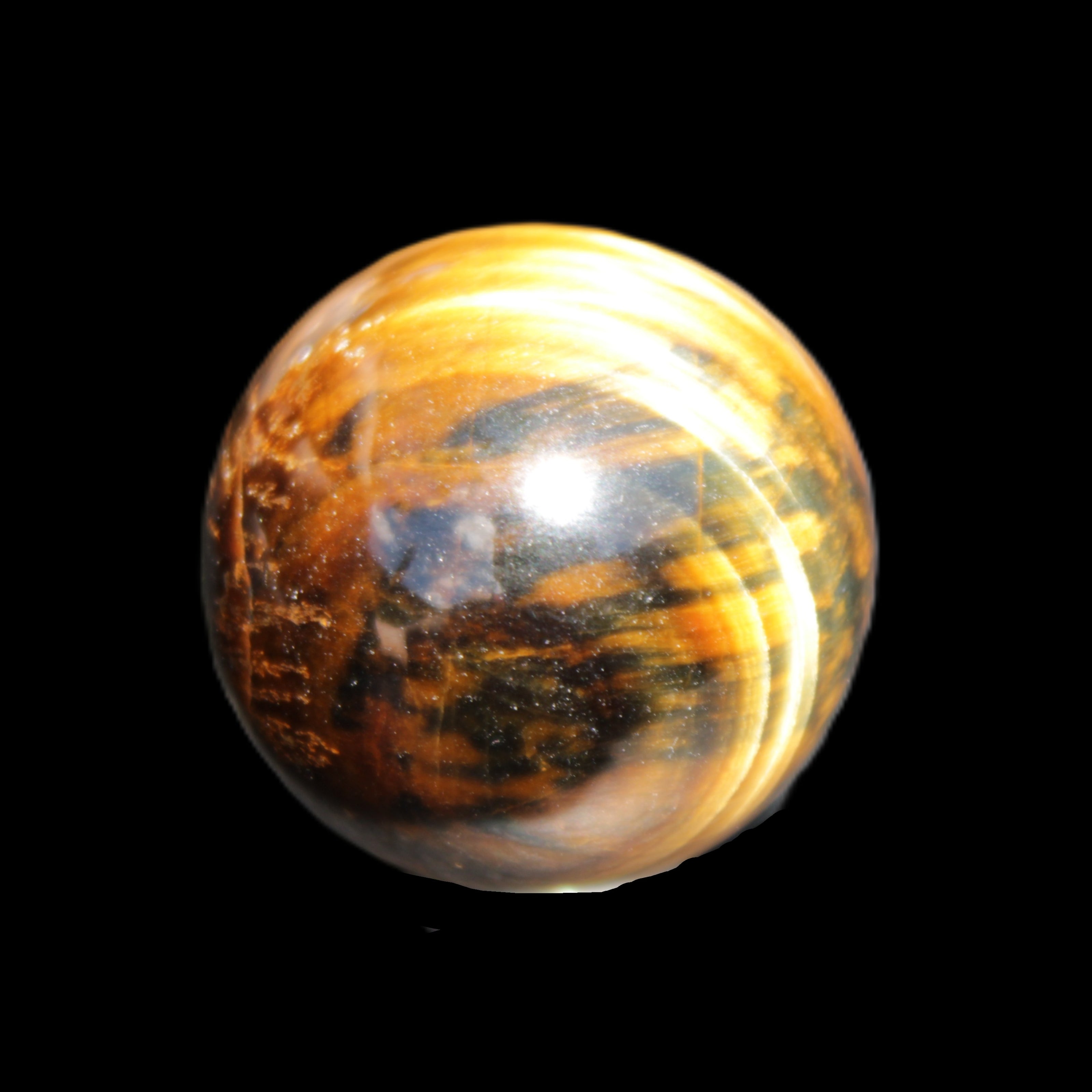 Golden Tigers Eye sphere 35mm 59g in sunlight - Rocks and Things Store