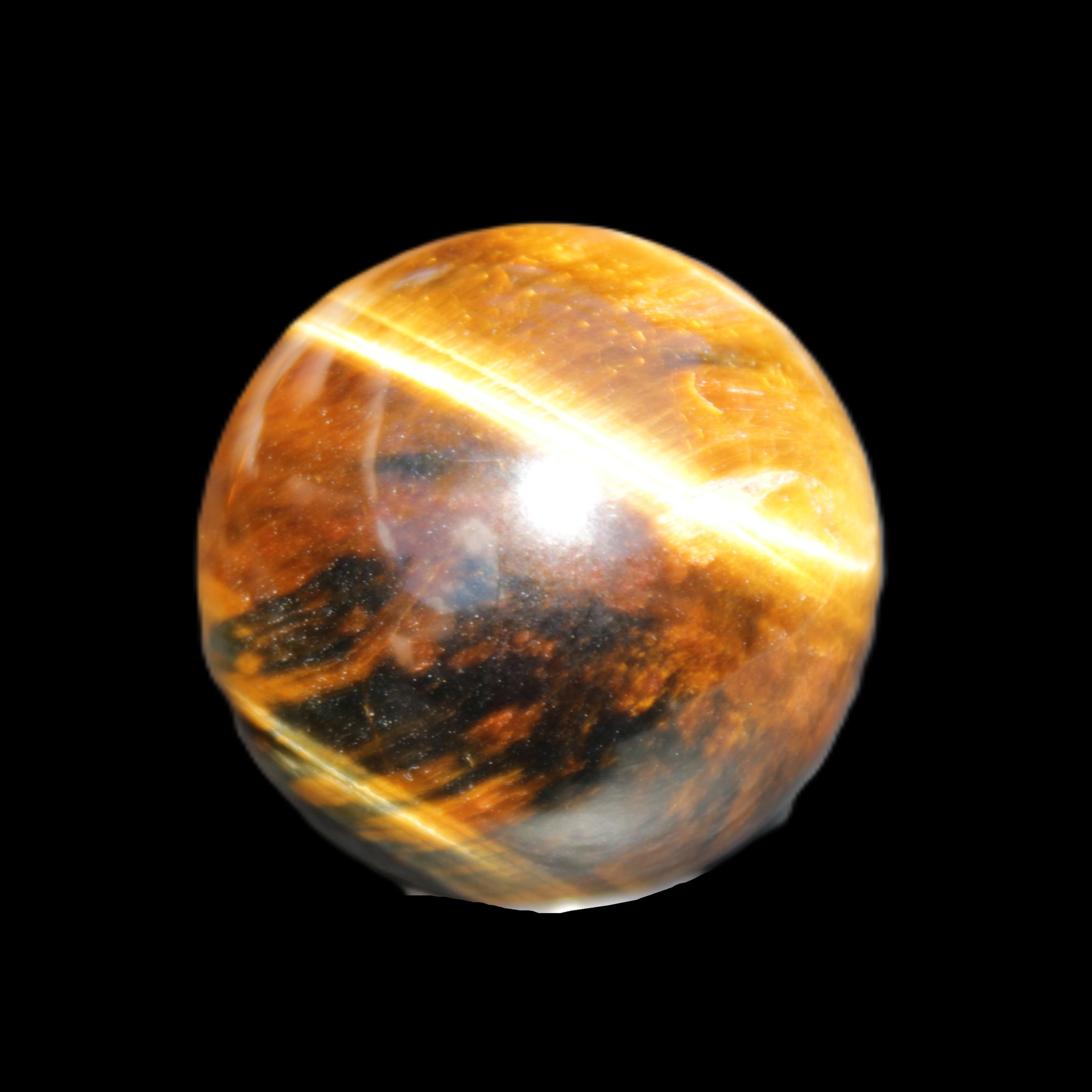 Golden Tigers Eye sphere 35mm 59g in sunlight - Rocks and Things Store