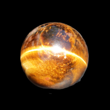 Golden Tigers Eye sphere 35mm 59g in sunlight - Rocks and Things Store