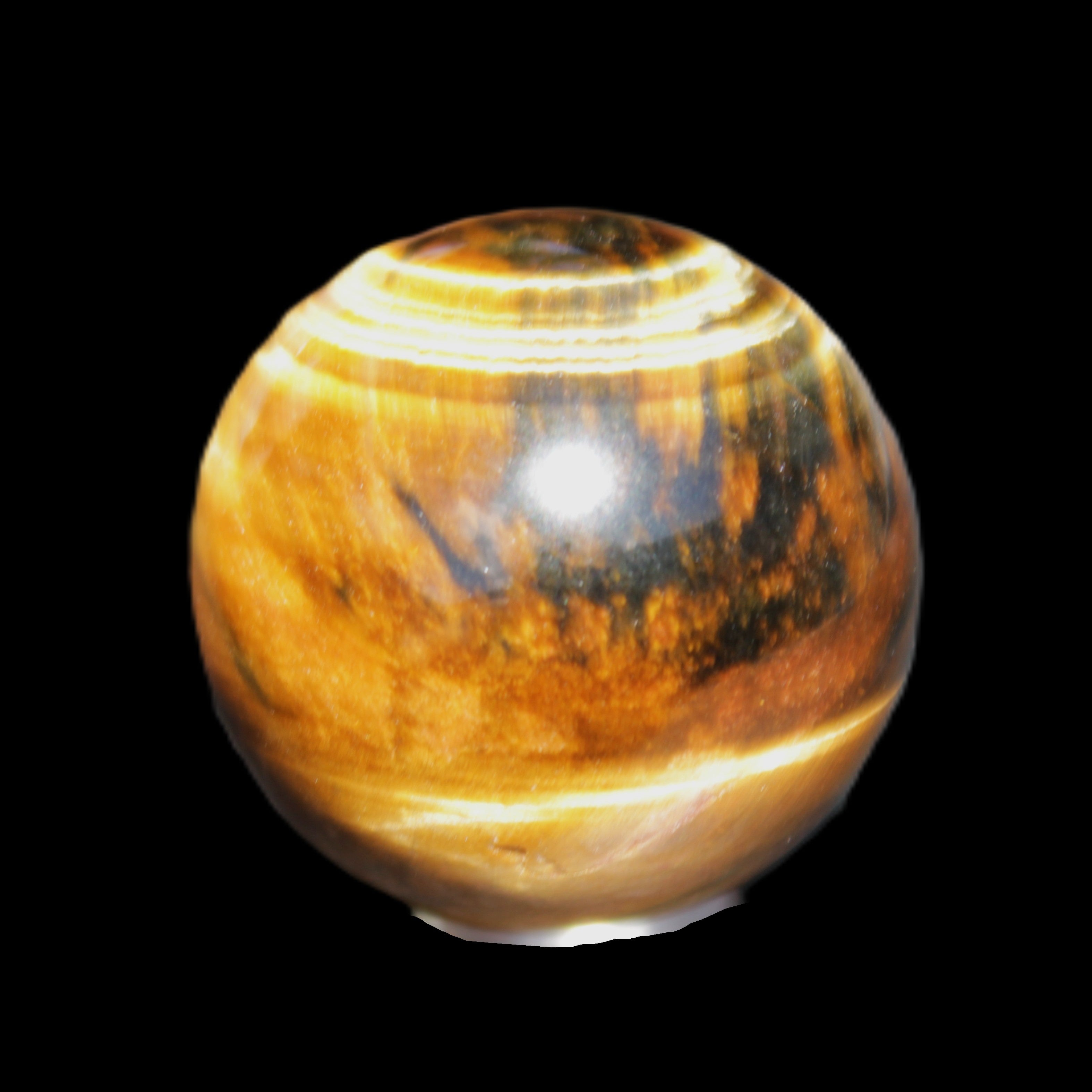 Golden Tigers Eye sphere 35mm 59g in sunlight - Rocks and Things Store