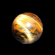 Golden Tigers Eye sphere 35mm 59g in sunlight - Rocks and Things Store