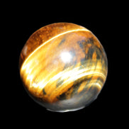 Golden Tigers Eye sphere 35mm 59g in sunlight - Rocks and Things Store