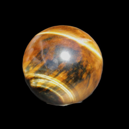 Golden Tigers Eye sphere 35mm 59g in sunlight - Rocks and Things Store