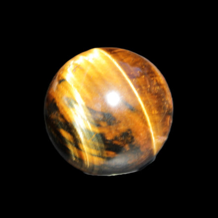 Golden Tigers Eye sphere 35mm 59g in sunlight - Rocks and Things Store