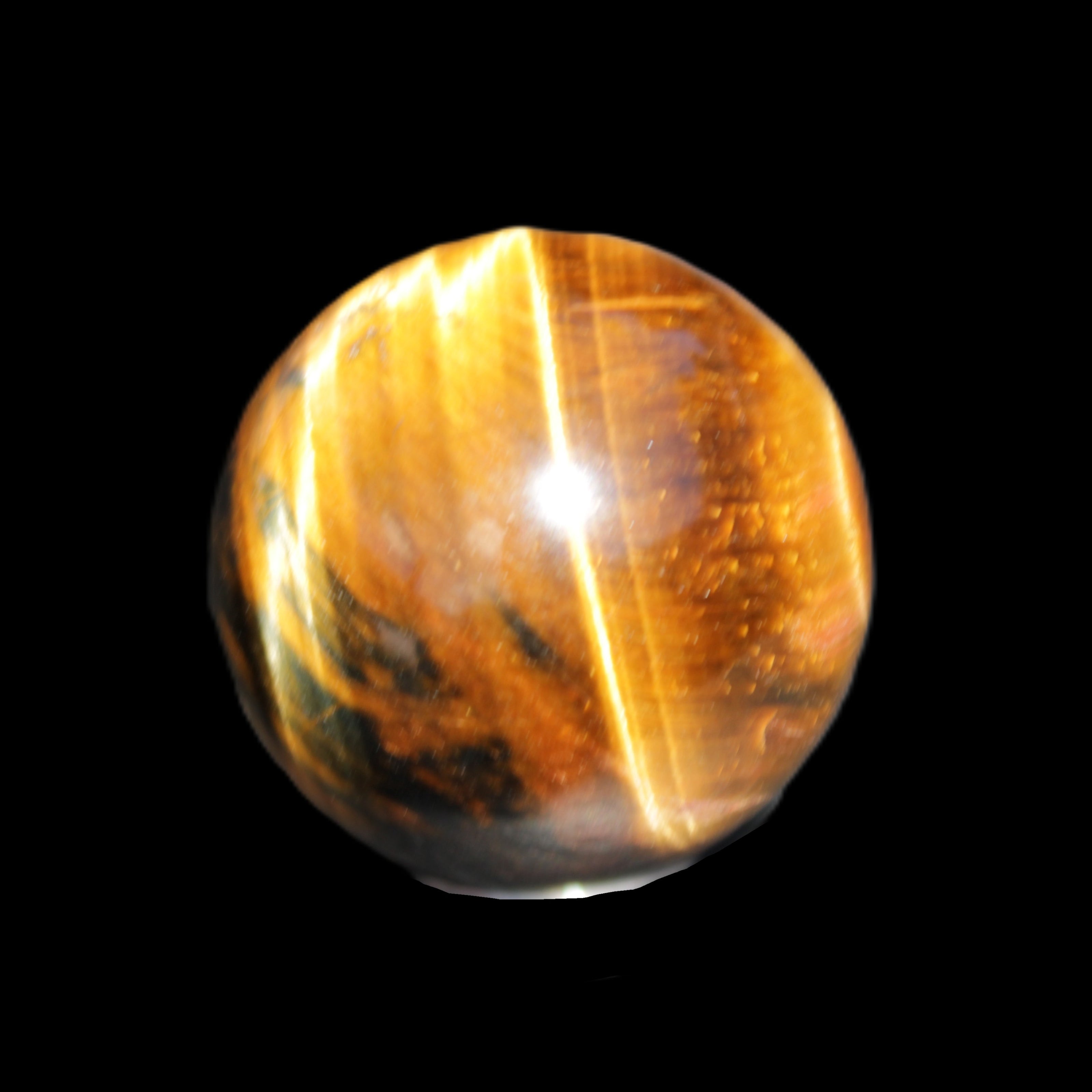 Golden Tigers Eye sphere 35mm 59g in sunlight - Rocks and Things Store