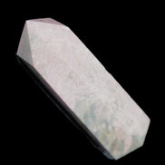 Pink Rhodonite wand 88mm 126g in sunlight - Rocks and Things Store