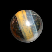 Blue Tigers Eye sphere 32mm 49g in sunlight - Rocks and Things Store