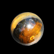 Blue Tigers Eye sphere 32mm 49g in sunlight - Rocks and Things Store